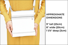 Load image into Gallery viewer, Brown and cream cow print vegan faux leather small cross body purse