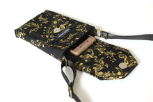 Load image into Gallery viewer, Cell phone purse - black fabric with metallic gold music design