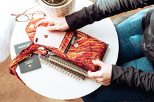 Load image into Gallery viewer, Cell phone purse - burnt orange marble design