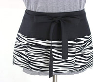 Load image into Gallery viewer, half apron with pockets, waitress apron with zipper pocket, zebra vendor apron, teacher apron, waist apron, utility apron black and white