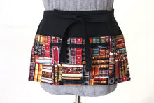 Load image into Gallery viewer, pocket apron gift for book lover - teacher appreciation gift - book print fabric half apron - black utility apron zipper pocket waist apron