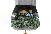 Load image into Gallery viewer, succulent half apron with pockets for women, vendor apron with zipper pocket for farmers market craft show, green cactus leaf florist gift