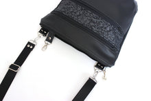 Load image into Gallery viewer, Black vegan leather crossbody bag with lots of pockets for everyday carry essentials, medium sized, zipper closure, adjustable strap