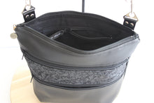 Load image into Gallery viewer, Black vegan leather crossbody bag with lots of pockets for everyday carry essentials, medium sized, zipper closure, adjustable strap
