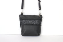Load image into Gallery viewer, Black vegan leather crossbody bag with lots of pockets for everyday carry essentials, medium sized, zipper closure, adjustable strap