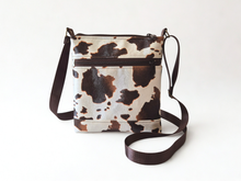 Load image into Gallery viewer, Brown and cream cow print vegan faux leather small cross body purse
