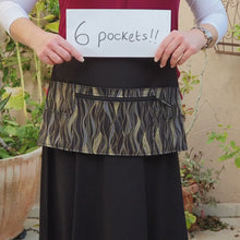 Load and play video in Gallery viewer, Black utility apron with zipper pocket for teacher vendor server
