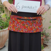 Load and play video in Gallery viewer, Alphabet teacher apron with pockets - abc half apron with zipper pocket
