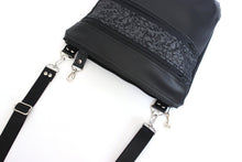 Load image into Gallery viewer, Black vegan leather crossbody bag with lots of pockets for everyday carry essentials, medium sized, zipper closure, adjustable strap
